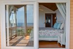 Looking into guest king bedroom from it`s private deck